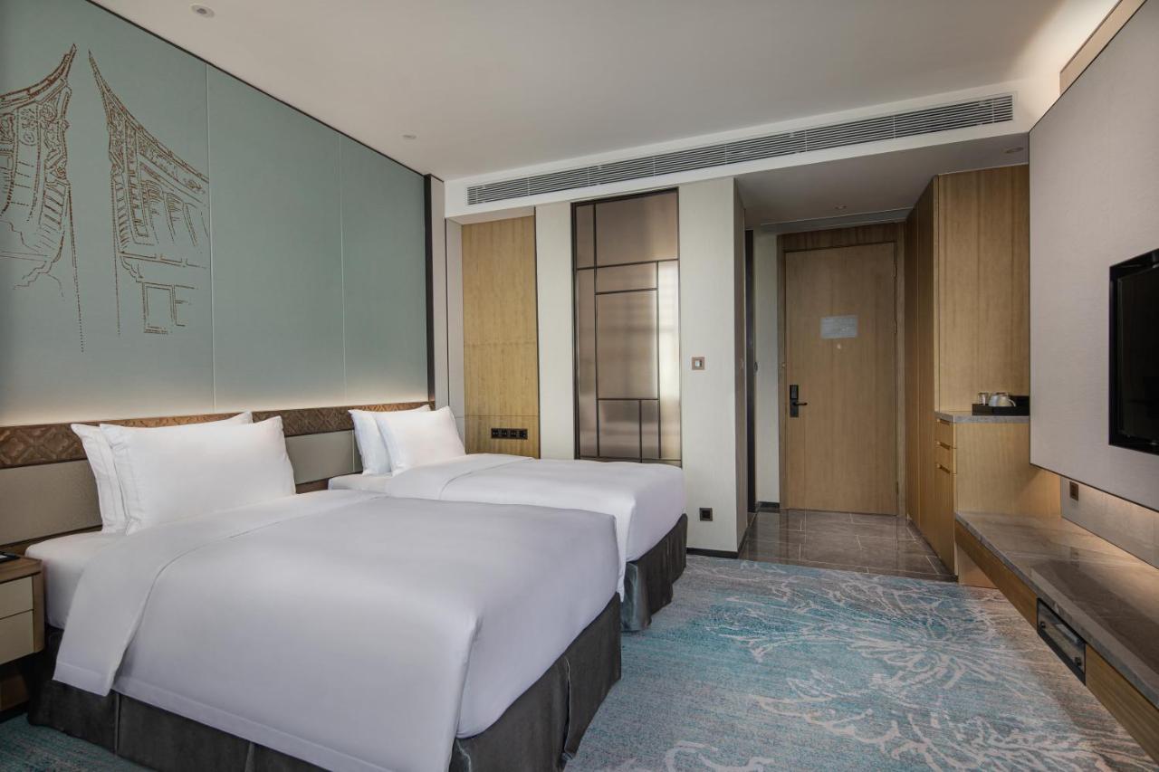 Xiamen Xiangan C&D Hotel Bagian luar foto