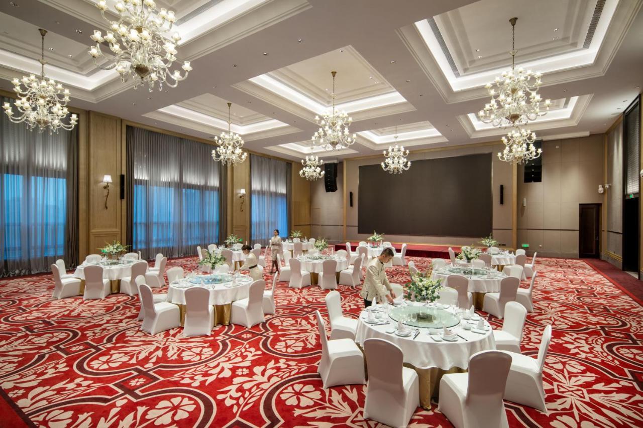Xiamen Xiangan C&D Hotel Bagian luar foto