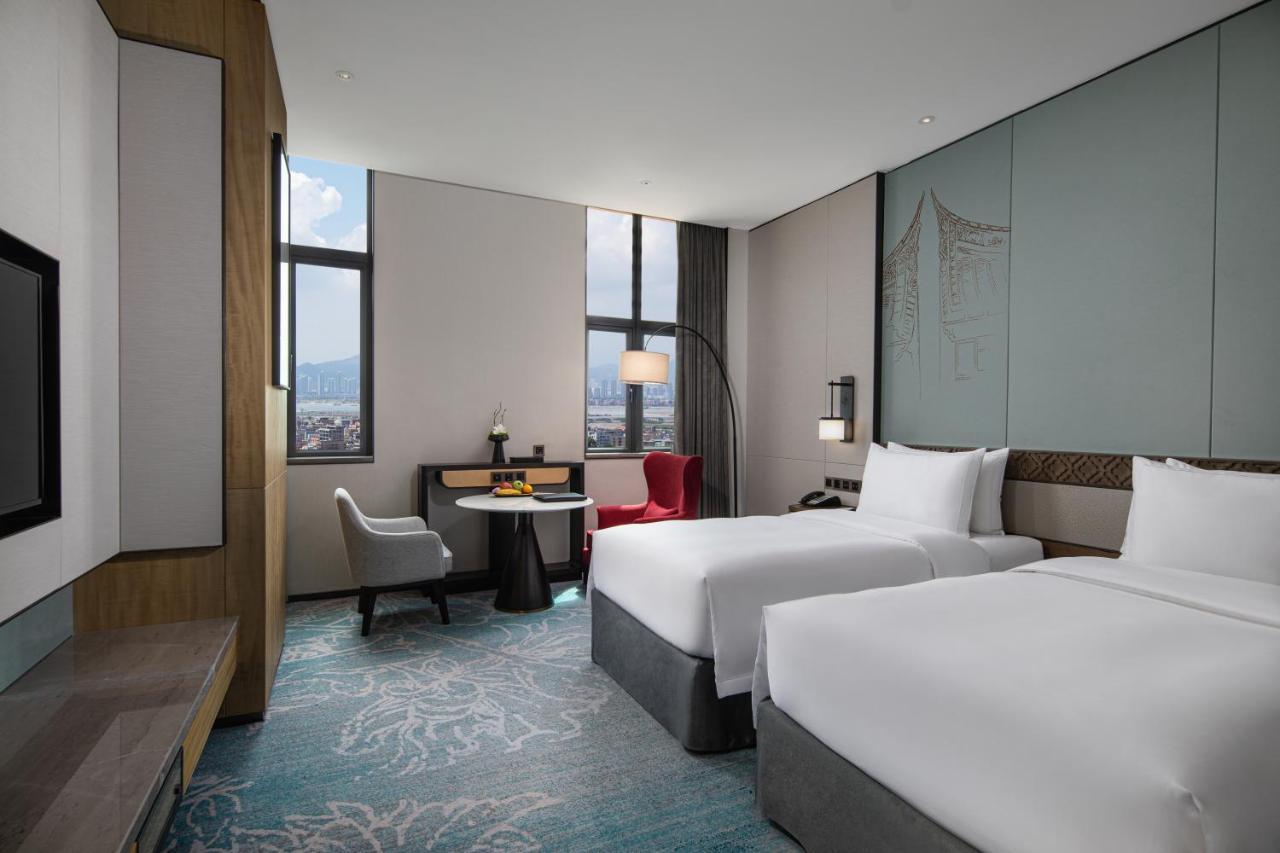Xiamen Xiangan C&D Hotel Bagian luar foto