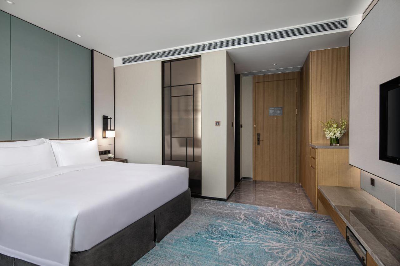 Xiamen Xiangan C&D Hotel Bagian luar foto